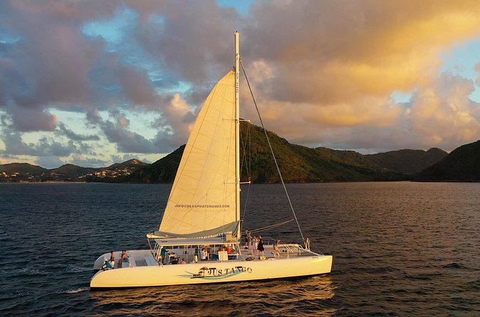 Champagne Sunset Sail in St. Lucia - The sunset, the coast, and the green flash