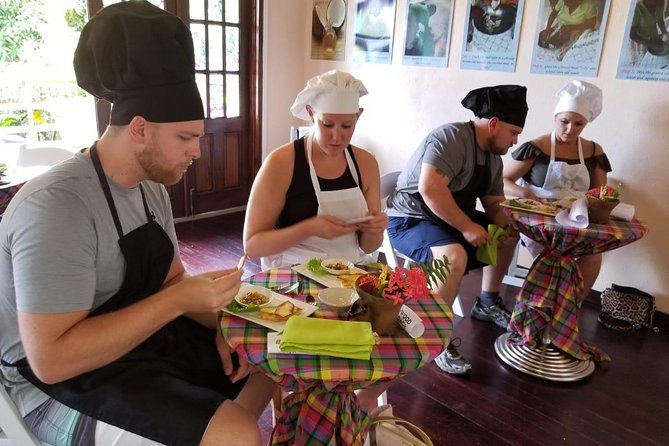Flavors of St Lucia Culinary Experience - Cooking green figs, salt fish, and Creole dishes