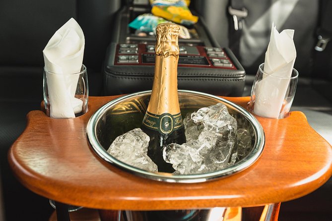 Private Luxury Transfer - One Way (Hewanorra International Airport UVF) - A sedan, local drinks, and useful comforts