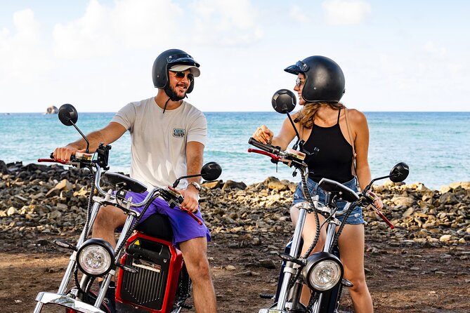 St.Lucia Beaches and Backroads Tour by Electric Big-Wheel Scooter - Gros Islet gives you a working village view